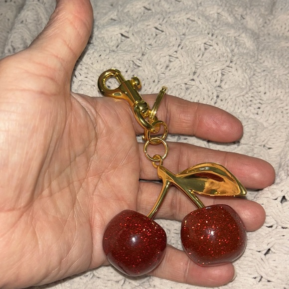 Cherry sparkly bag charm so cute 
New in plastic - Picture 1 of 4